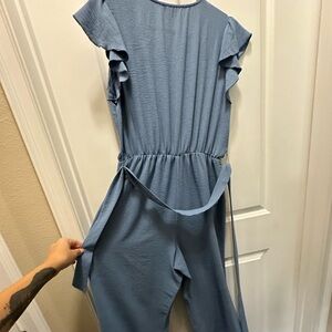 2 Jumpsuits Size Large Black size Medium Blue